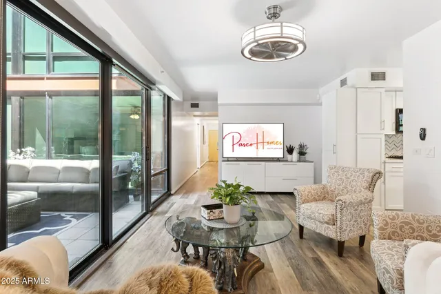 a living room with furniture and a window