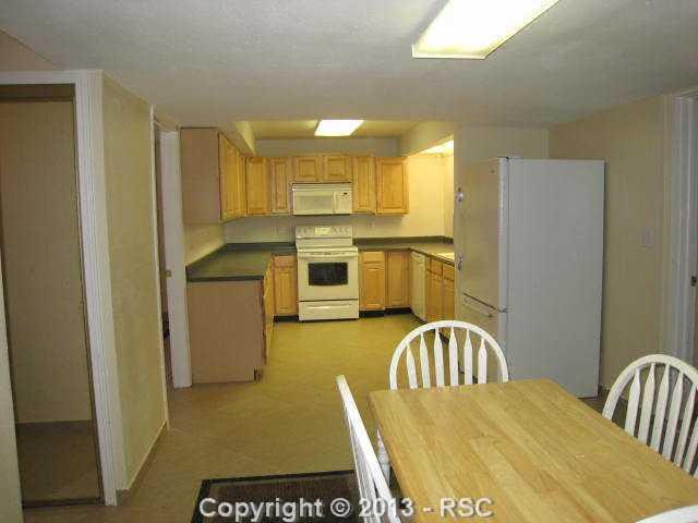 8650 Wildridge Road Colorado Springs, CO 80908 - Photo 19 of 25 Basement suite has kitchen, dining area, bedroom & bath and adjoins the family room