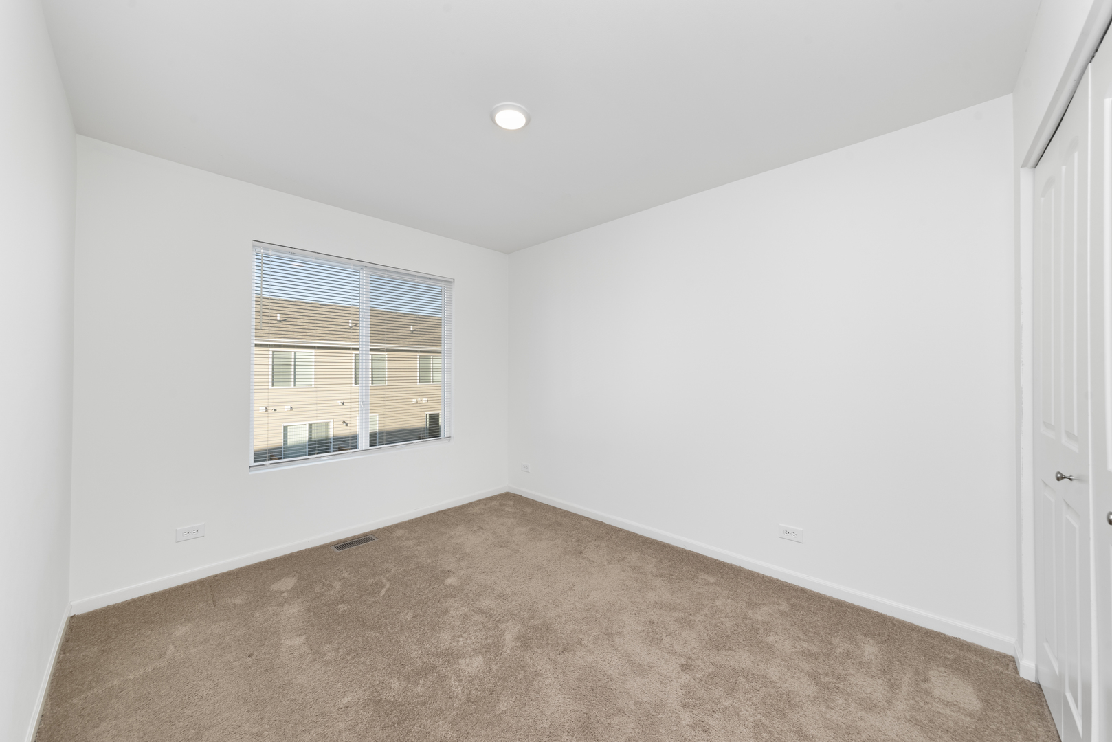 2327 Upland Road Pingree Grove, IL 60140 - Photo 11 of 16 an empty room with windows