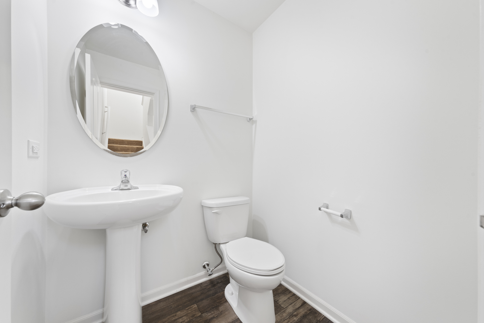 2327 Upland Road Pingree Grove, IL 60140 - Photo 7 of 16 a bathroom with a sink a toilet and a mirror