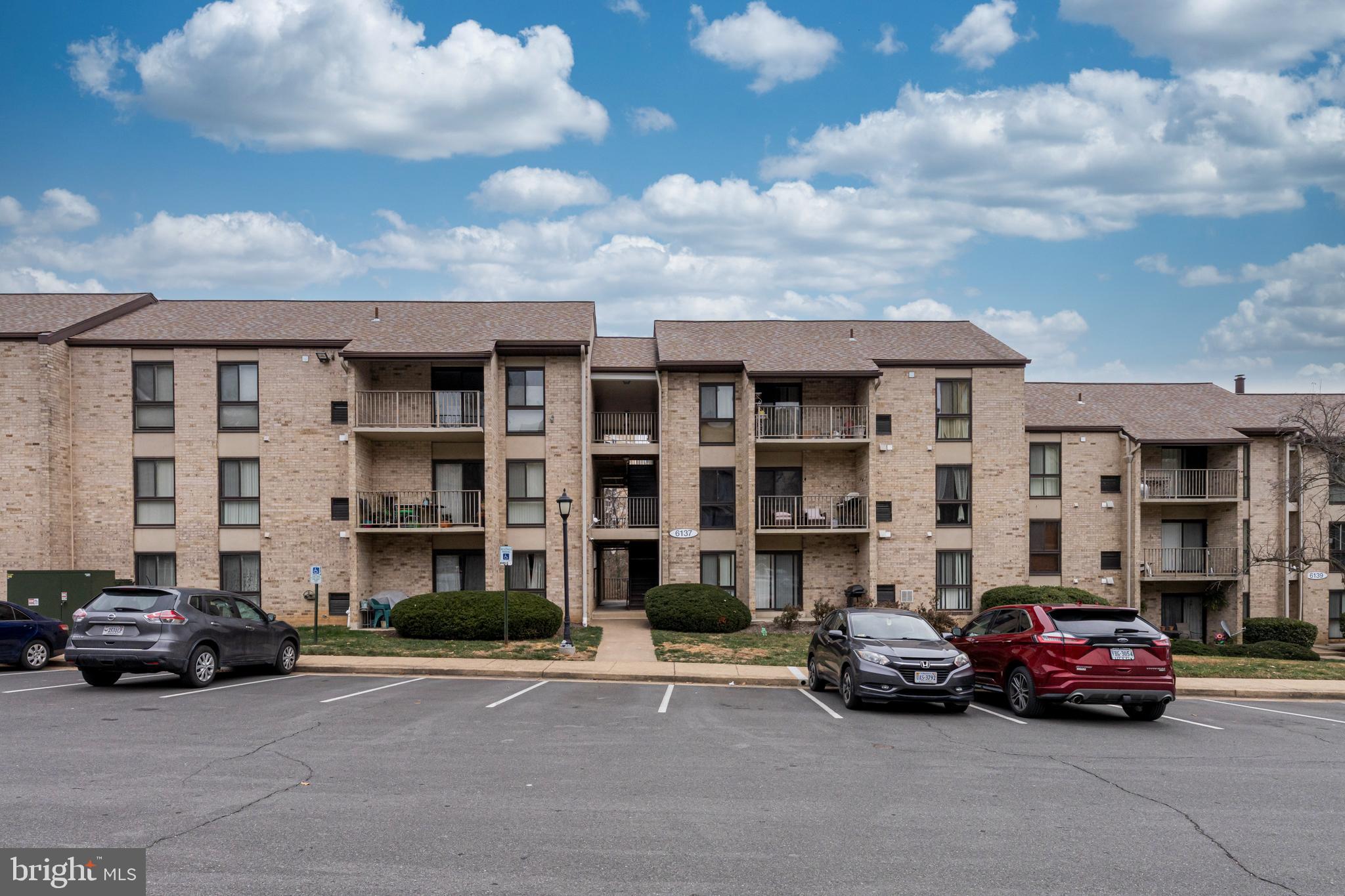 6137 Edsall Road, Unit I Alexandria, VA 22304 - Photo 2 of 28 a car parked in front of a building
