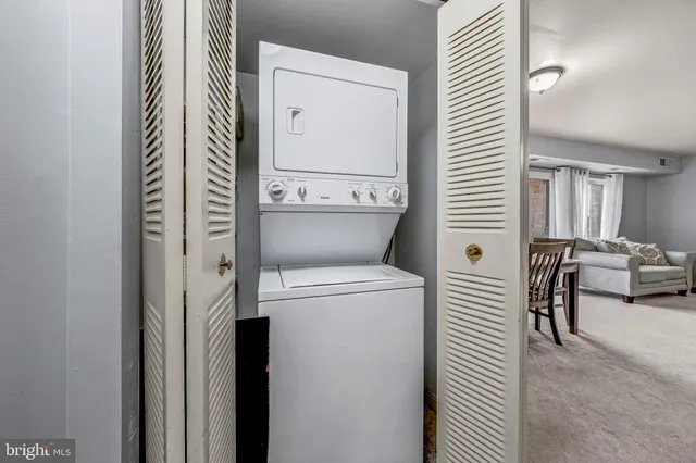 a view of living room with washer and dryer