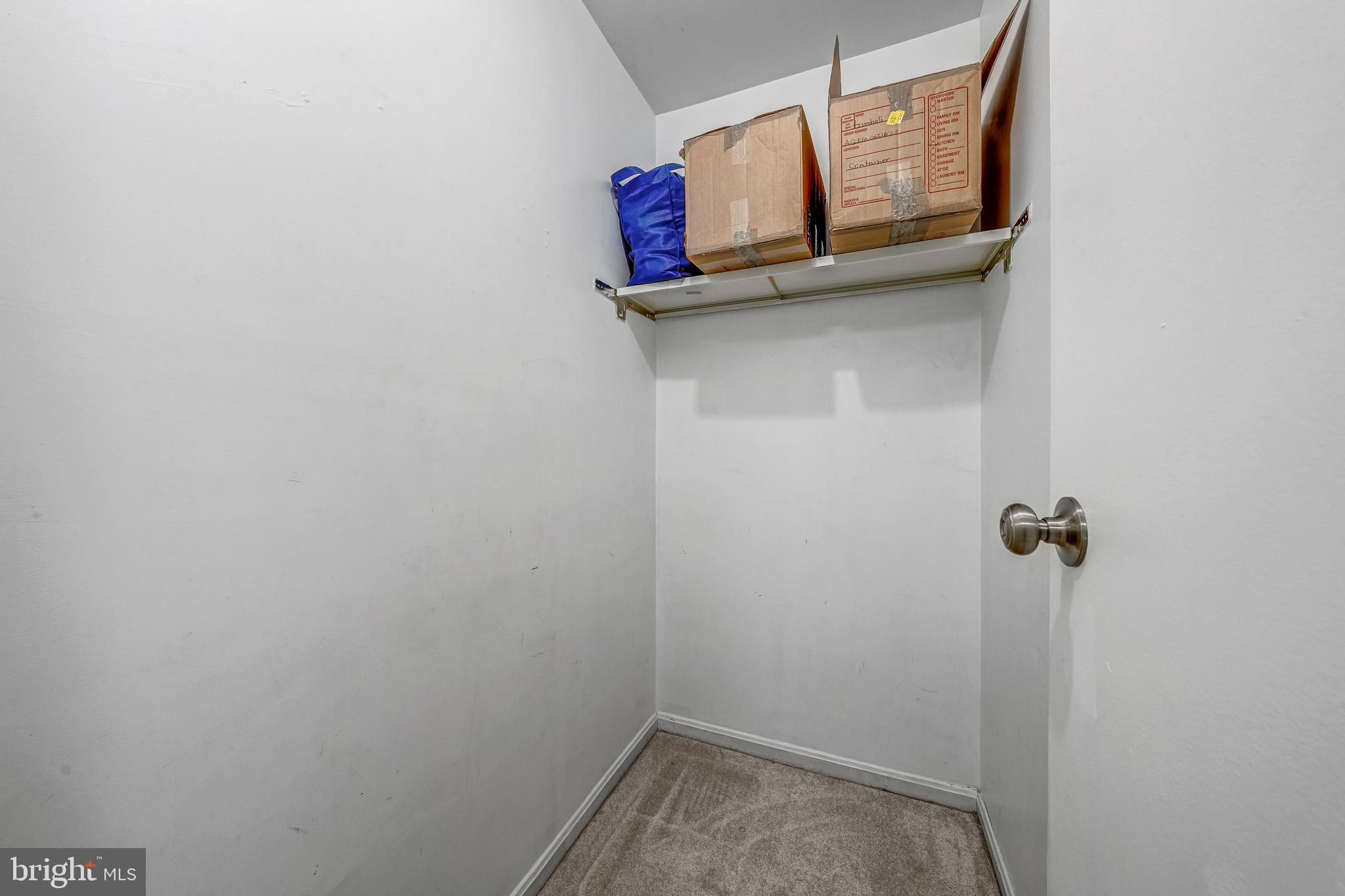 6137 Edsall Road, Unit I Alexandria, VA 22304 - Photo 25 of 28 a small space with a mirror