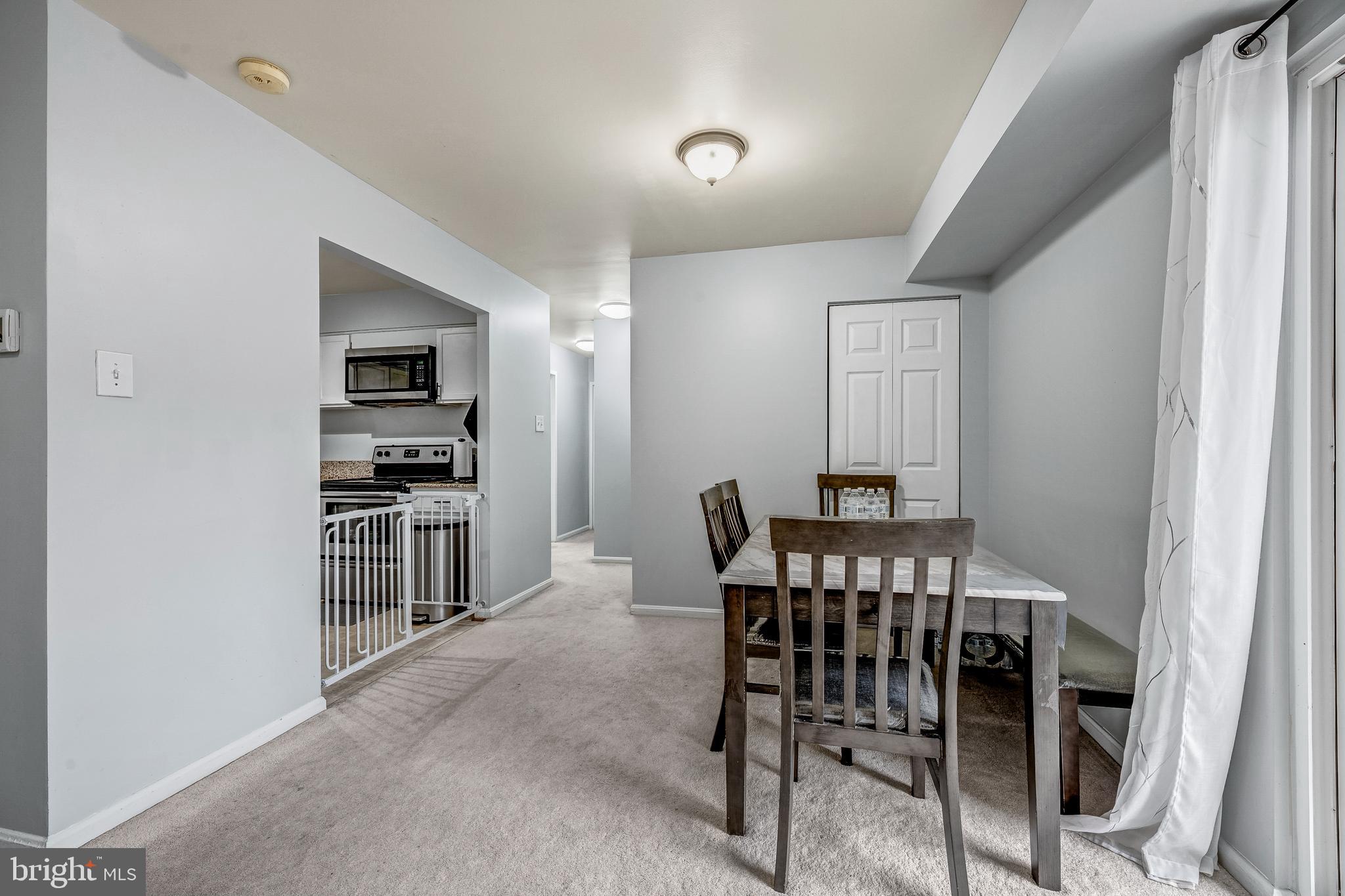 6137 Edsall Road, Unit I Alexandria, VA 22304 - Photo 10 of 28 a view of a dining room with furniture