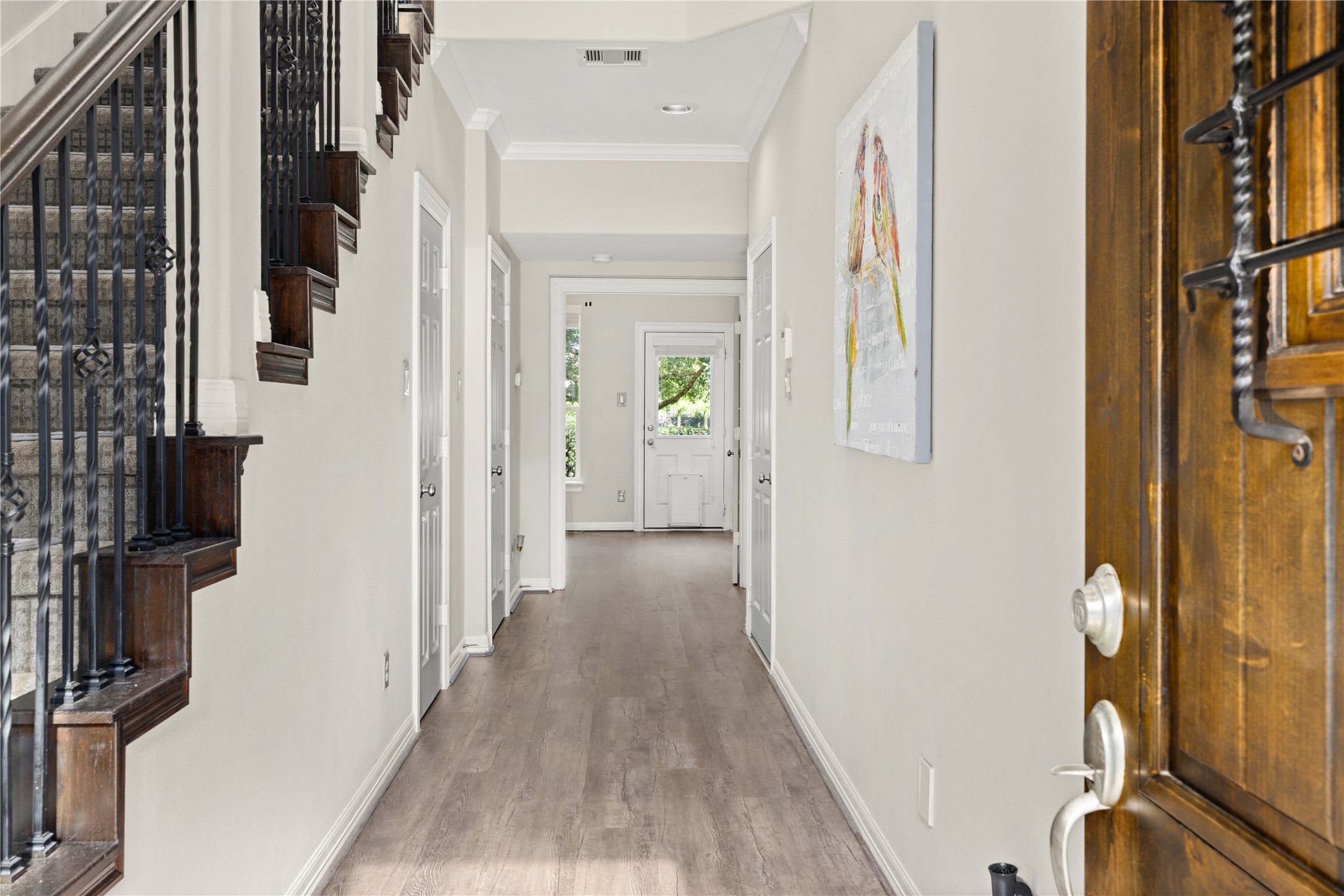 10215 Spring Shadows Park Circle Houston, TX 77080 - Photo 4 of 44 Upgraded LVP flooring throughout home