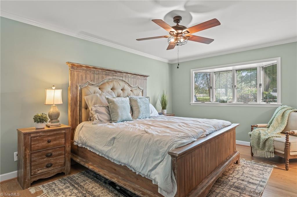 2641 Mock Road High Point, NC 27265 - Photo 25 of 50 Main Level Primary Bedroom with gleaming hardwoods!