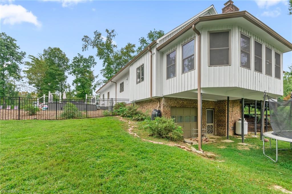 2641 Mock Road High Point, NC 27265 - Photo 42 of 50 Sunroom on the distant right ~ 3rd garage basement bay