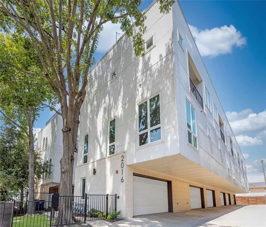 a view of a building with a tree