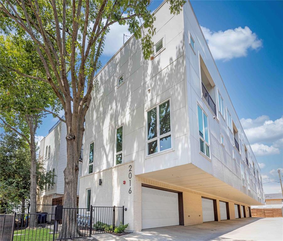 a view of a building with a tree