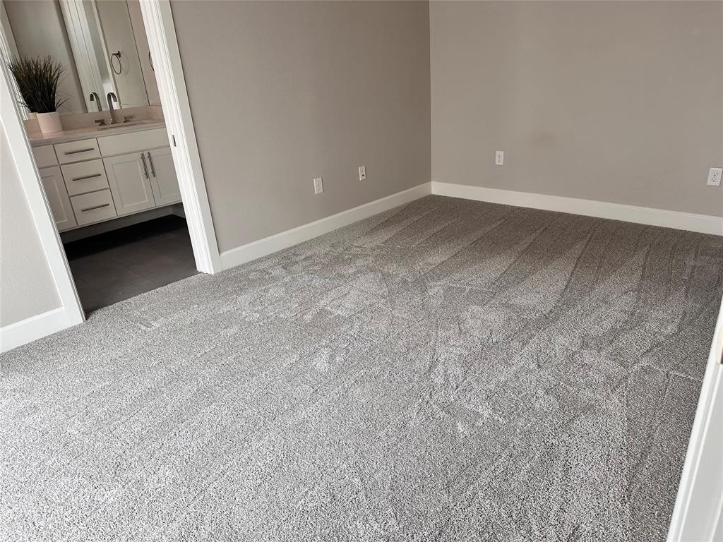 2016 North Fitzhugh Avenue, Unit 101 Dallas, TX 75204 - Photo 15 of 27 a view of an empty room and fire place