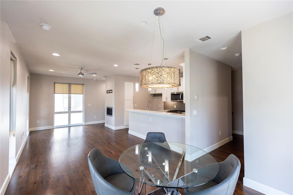 2016 North Fitzhugh Avenue, Unit 101 Dallas, TX 75204 - Photo 5 of 27 a view of a livingroom with furniture and window