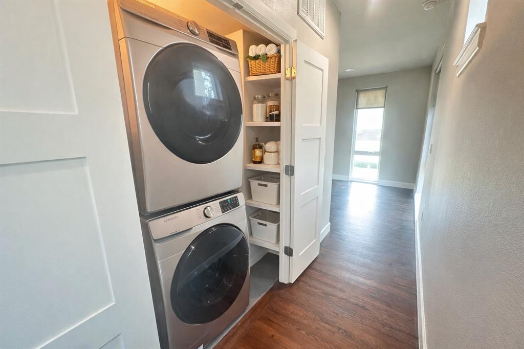 2016 North Fitzhugh Avenue, Unit 101 Dallas, TX 75204 - Photo 9 of 27 a view of a hallway with washer and dryer