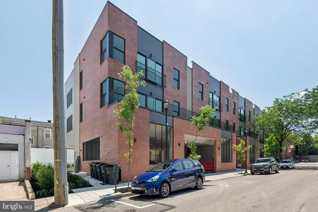 a car parked in front of a building