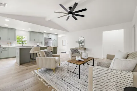 a kitchen with a stove and cabinets