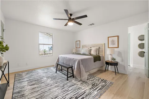 a living room with furniture and a rug