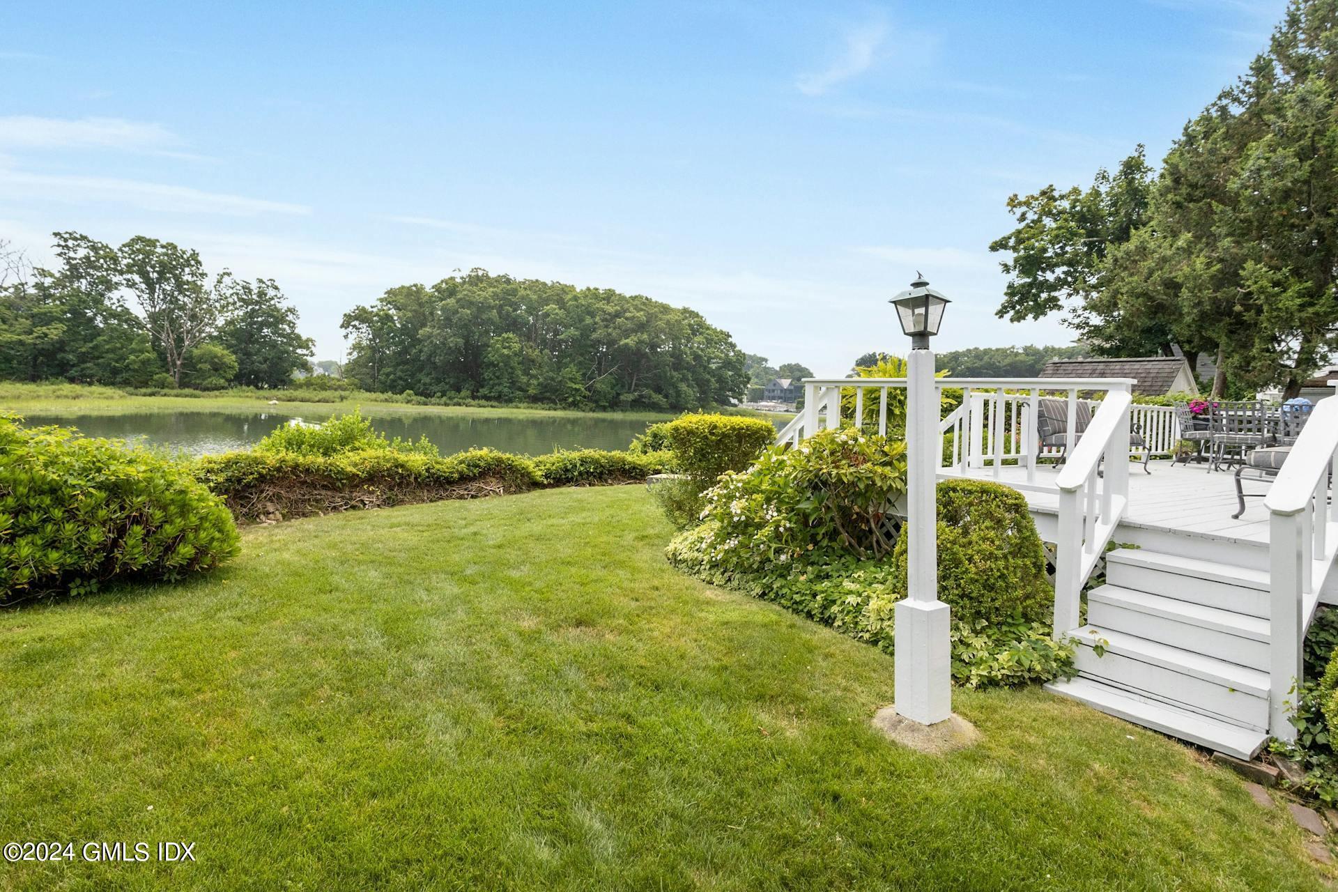 61 Roton Avenue Norwalk, CT 06853 - Photo 22 of 31 a view of a house with a yard