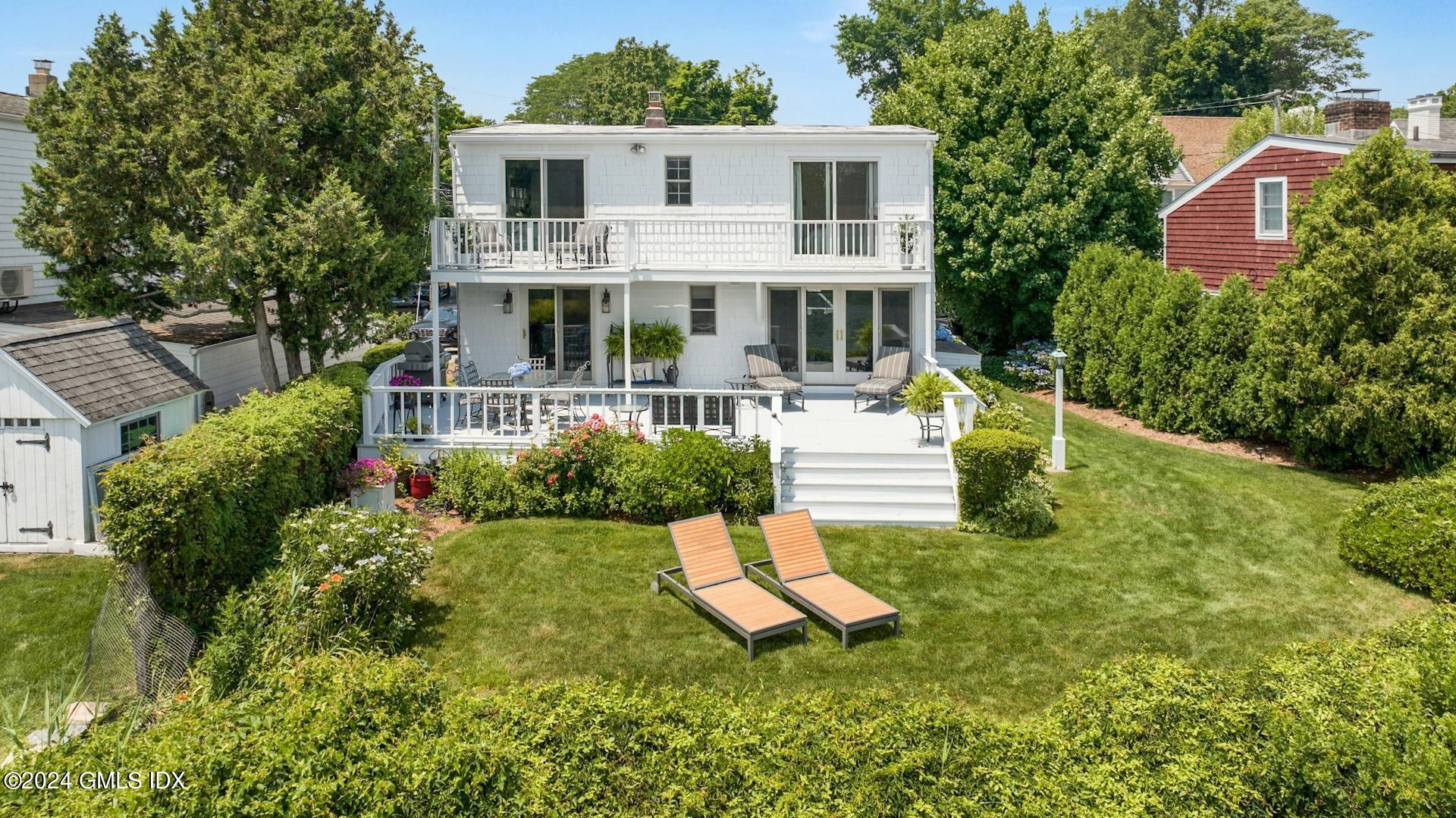 61 Roton Avenue Norwalk, CT 06853 - Photo 23 of 31 a view of a house with backyard and sitting area
