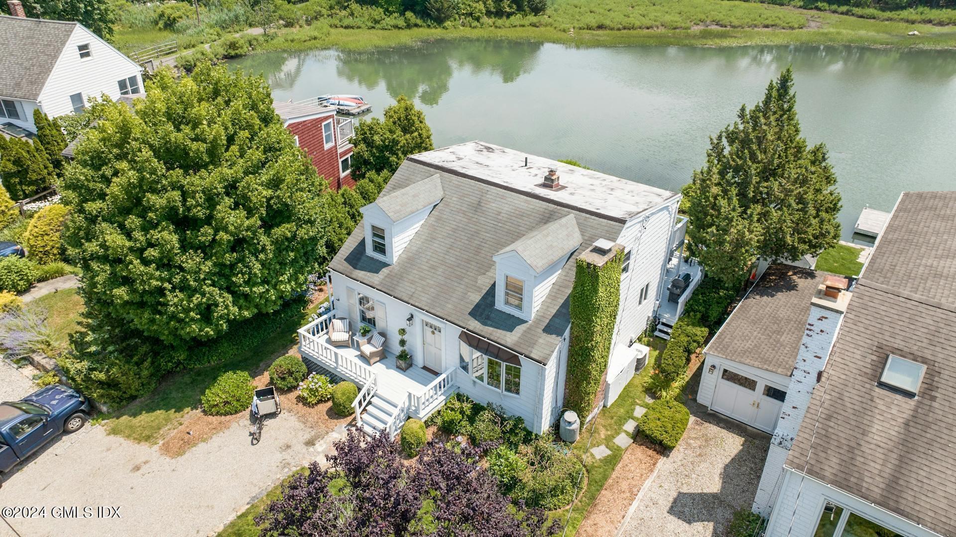 61 Roton Avenue Norwalk, CT 06853 - Photo 26 of 31 an aerial view of a house with a lake view