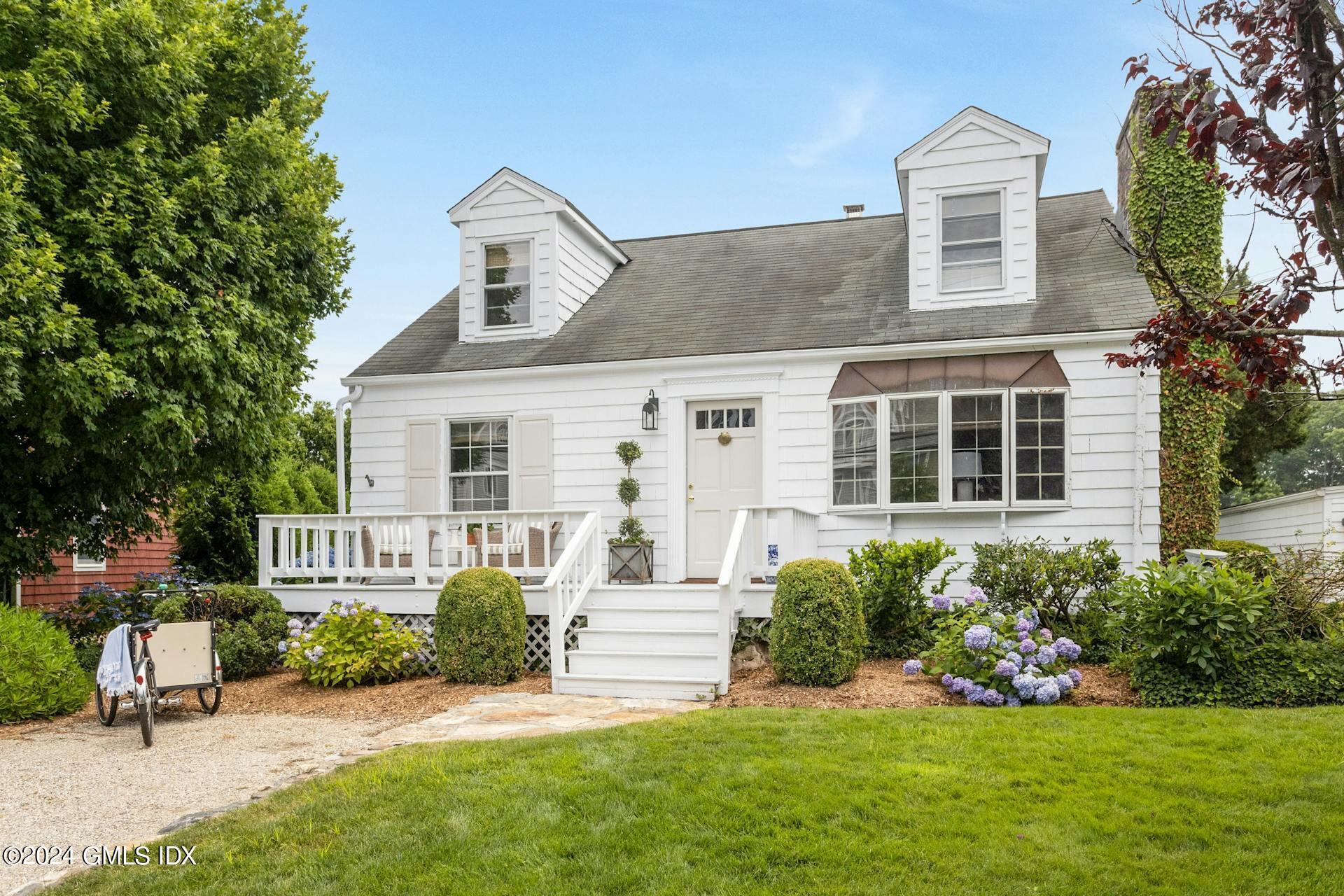 61 Roton Avenue Norwalk, CT 06853 - Photo 3 of 31 front view of a house with a yard