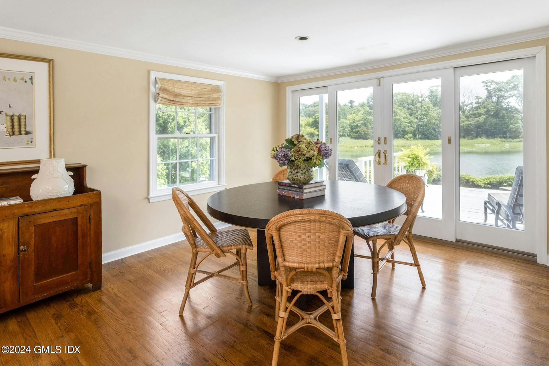 61 Roton Avenue Norwalk, CT 06853 - Photo 6 of 31 a dining room with furniture window wooden floor