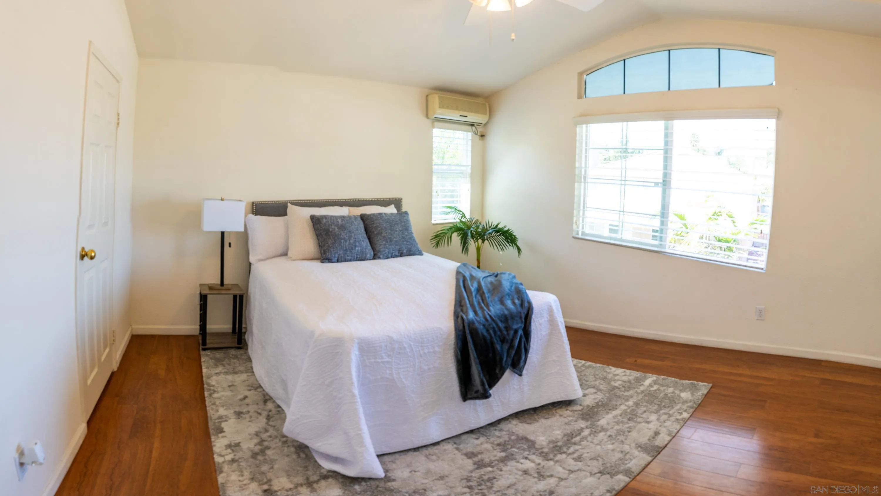 1246 Stagecoach Trail Loop Chula Vista, CA 91915 - Photo 9 of 17 a bed sitting in a bedroom next to a window