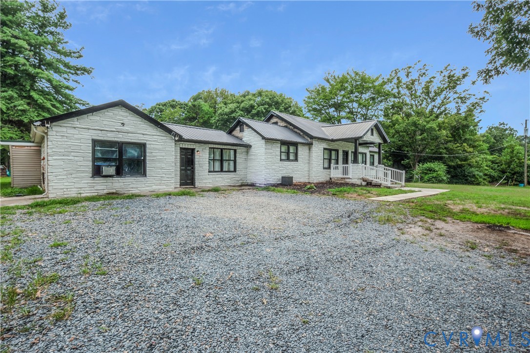 3331 South Constitution Route Dillwyn, VA 23936 - Photo 3 of 24 View of front of house with stone siding, a porch,