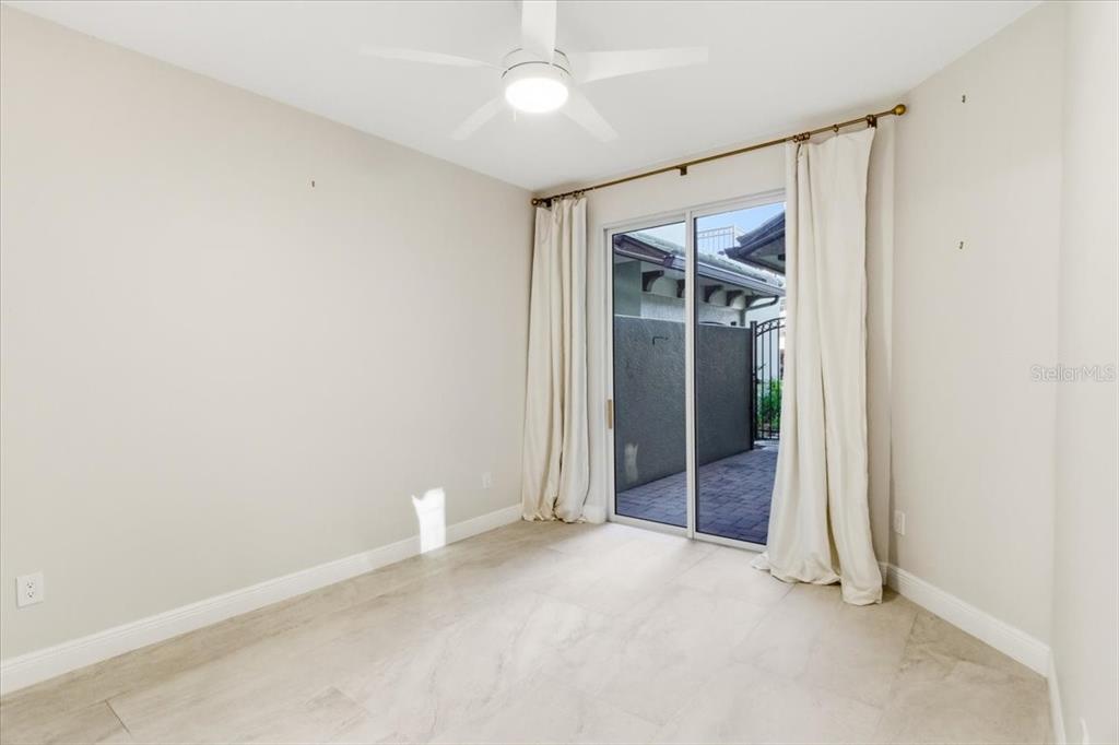 6536 Moorings Point Circle, Unit 101 Lakewood Ranch, FL 34202 - Photo 33 of 48 an empty room with a bathroom