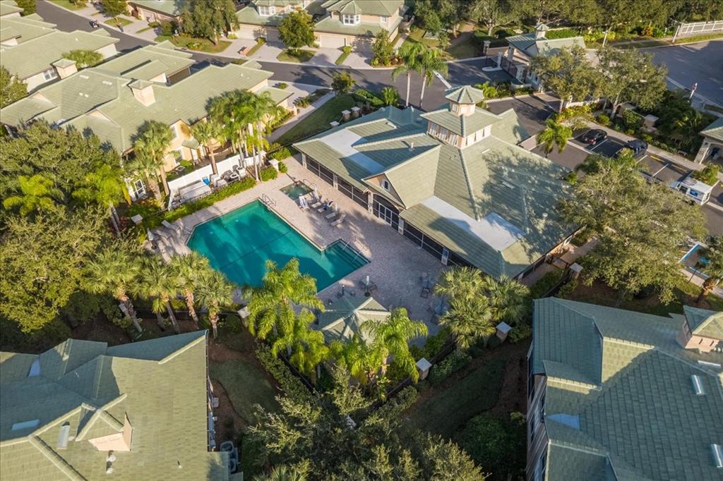 6536 Moorings Point Circle, Unit 101 Lakewood Ranch, FL 34202 - Photo 46 of 48 an aerial view of a residential houses with outdoor space