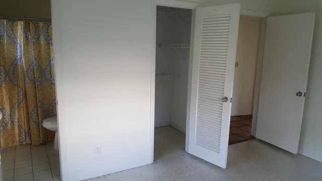 a view of a backyard with a trees