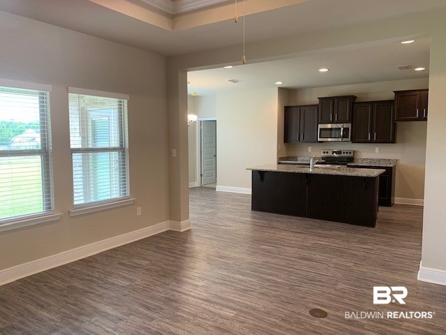 1414 Hickory Street South, Unit 3 Foley, AL 36535 - Photo 8 of 15 Family room to kitchen