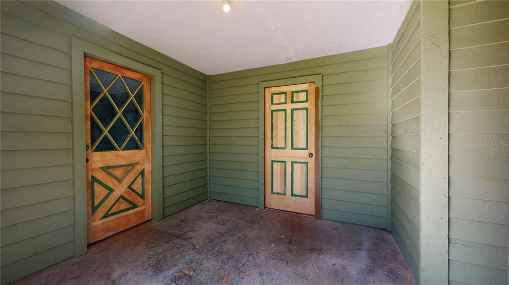 19803 Reading Road Lutz, FL 33558 - Photo 43 of 48 a view of an front door