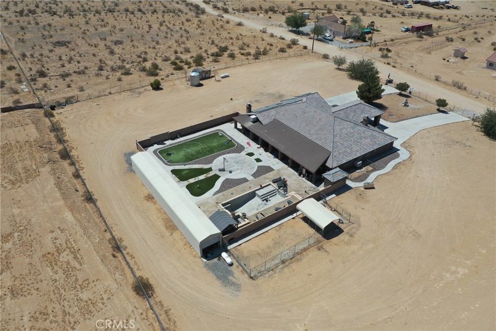 24625 Ledbury Road Oro Grande, CA 92368 - Photo 15 of 51 an aerial view of a house with a yard and ocean view