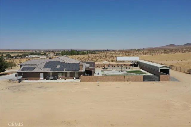 a living room with furniture window and a flat screen tv