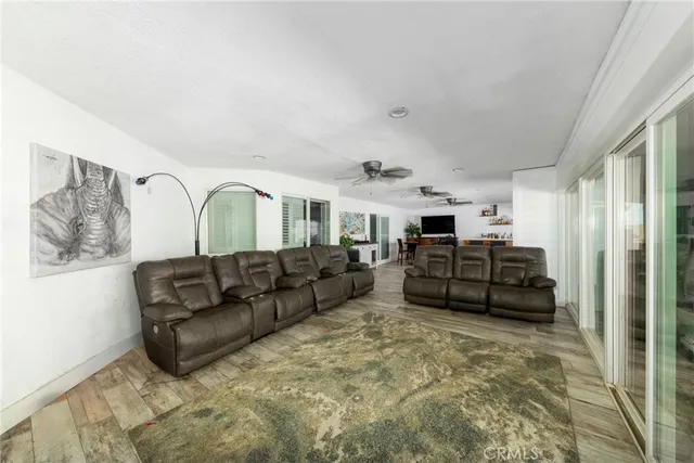 a view of room with a ceiling fan