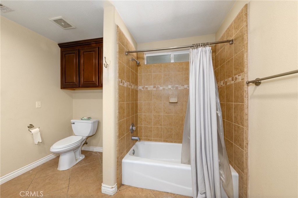 24625 Ledbury Road Oro Grande, CA 92368 - Photo 30 of 51 a bathroom with a toilet and a shower