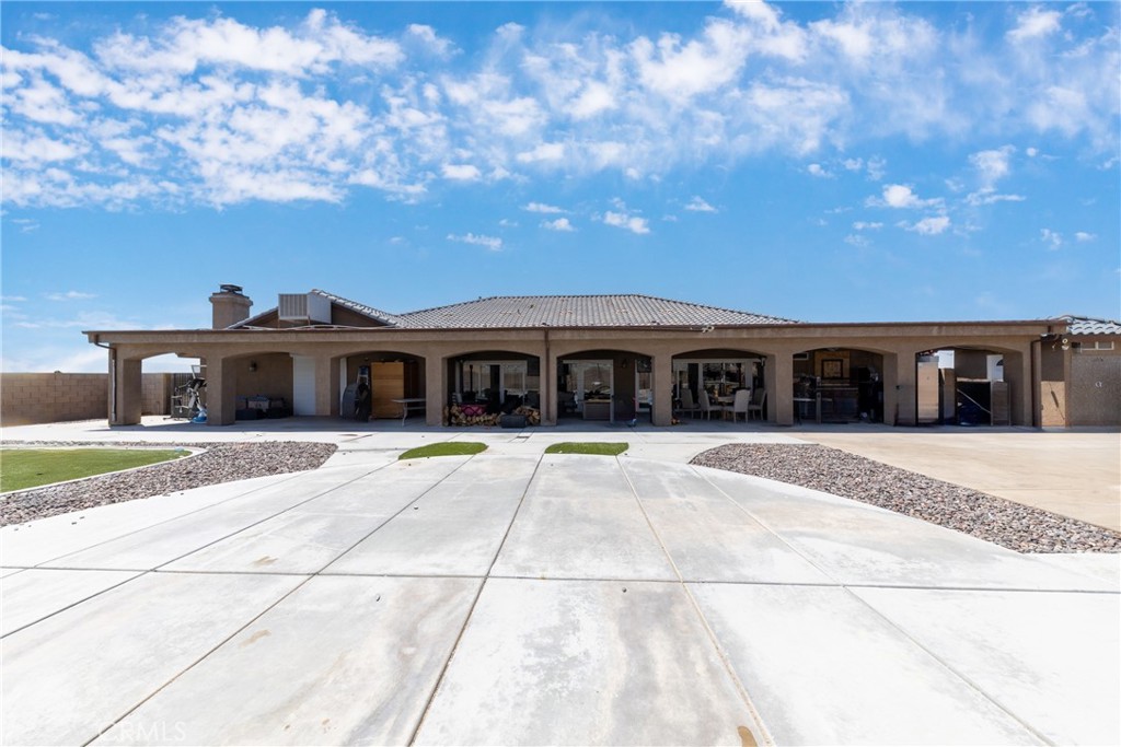 24625 Ledbury Road Oro Grande, CA 92368 - Photo 48 of 51 a front view of a house with a yard