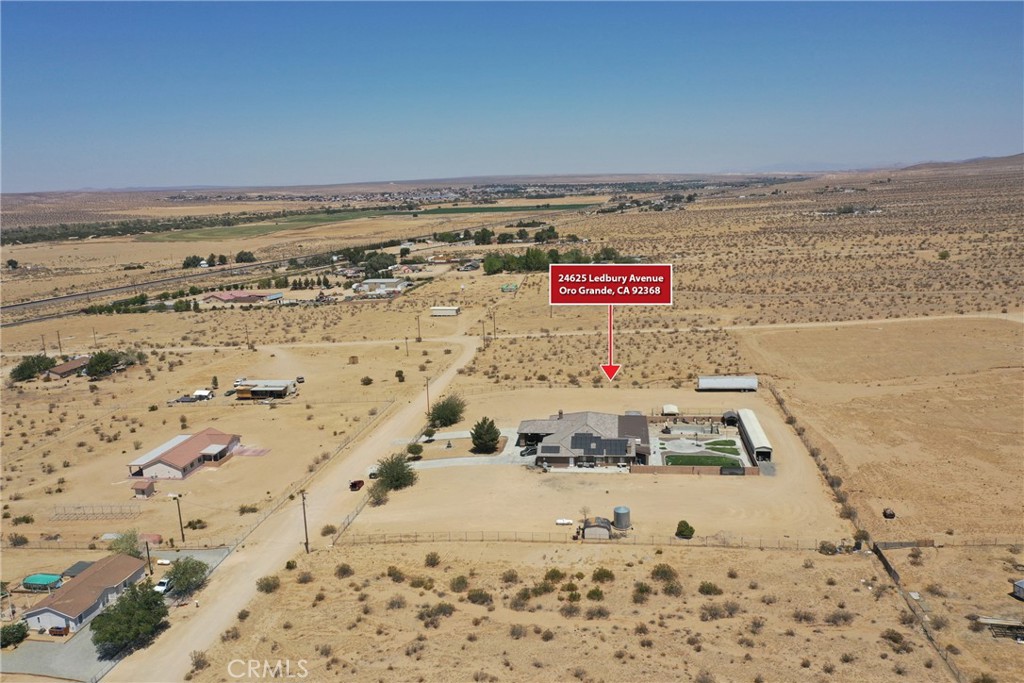 24625 Ledbury Road Oro Grande, CA 92368 - Photo 8 of 51 a view of water heater and snow