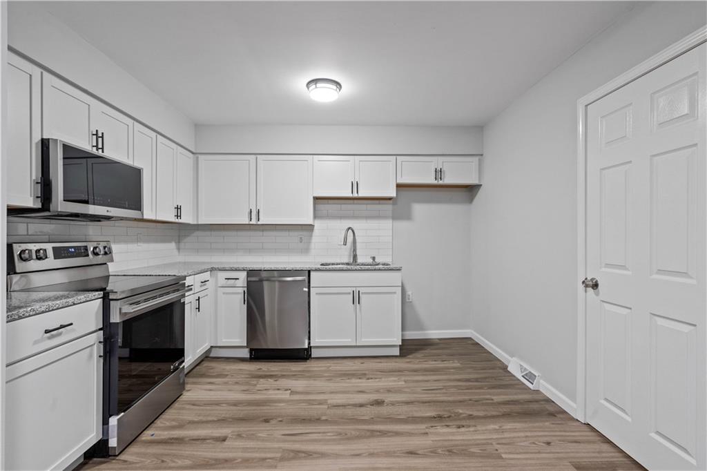 6924 Hunter Street Raytown, MO 64133 - Photo 8 of 27