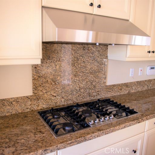 56 Twin Gables Irvine, CA 92620 - Photo 11 of 32 a sink with a stove