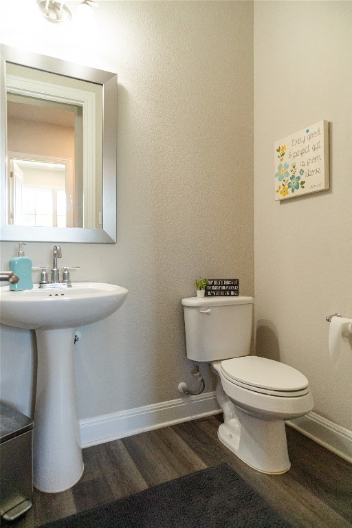 2616 Pine Branch Road Leander, TX 78641 - Photo 16 of 37 a bathroom with a sink toilet and a mirror
