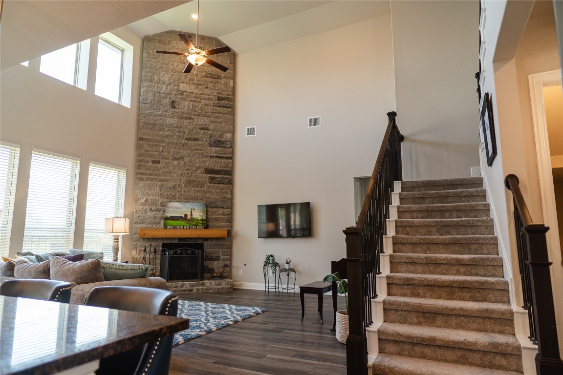 2616 Pine Branch Road Leander, TX 78641 - Photo 23 of 37 a living room with furniture and a fireplace