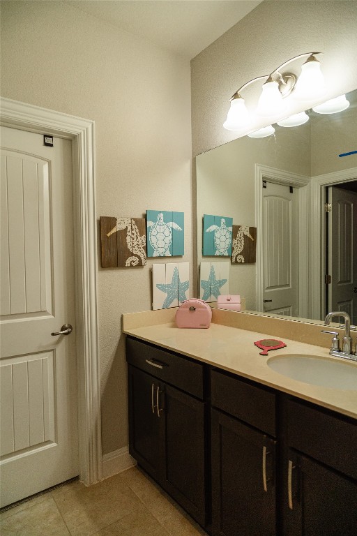 2616 Pine Branch Road Leander, TX 78641 - Photo 26 of 37 a bathroom with a double vanity sink mirror and double