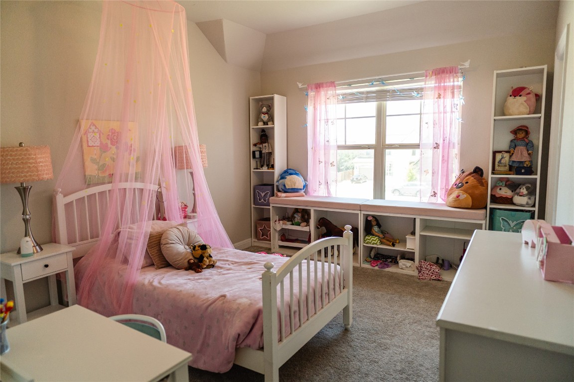 2616 Pine Branch Road Leander, TX 78641 - Photo 27 of 37 a bedroom with furniture and a large window