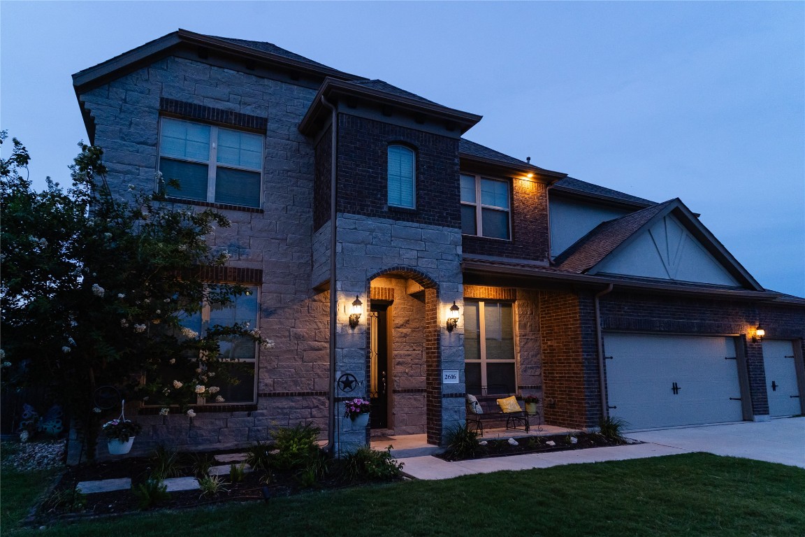 2616 Pine Branch Road Leander, TX 78641 - Photo 34 of 37 a front view of a house with garden