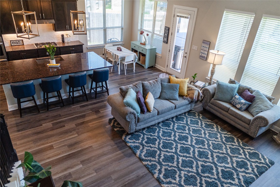 2616 Pine Branch Road Leander, TX 78641 - Photo 6 of 37 a living room with furniture and wooden floor