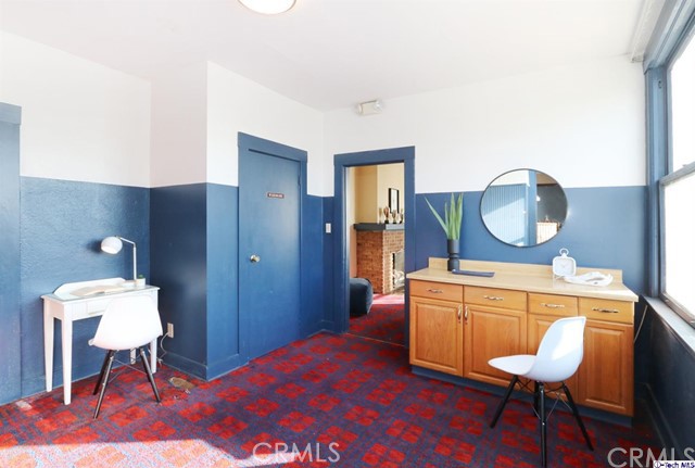 6401 Ruby Street Los Angeles, CA 90042 - Photo 17 of 27 a bedroom with a bed and a dresser