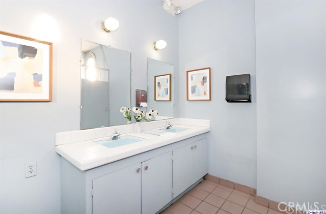 6401 Ruby Street Los Angeles, CA 90042 - Photo 22 of 27 a bathroom with a sink and a mirror