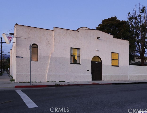 6401 Ruby Street Los Angeles, CA 90042 - Photo 3 of 27 a front view of a house with parking area