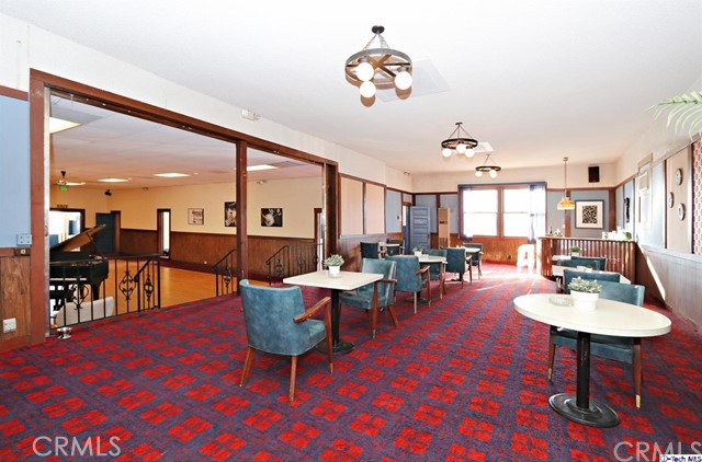 6401 Ruby Street Los Angeles, CA 90042 - Photo 8 of 27 a living room with furniture a coffee table and a potted plant