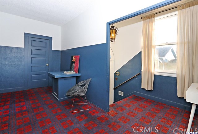 6401 Ruby Street Los Angeles, CA 90042 - Photo 10 of 27 a room with furniture and wooden floor